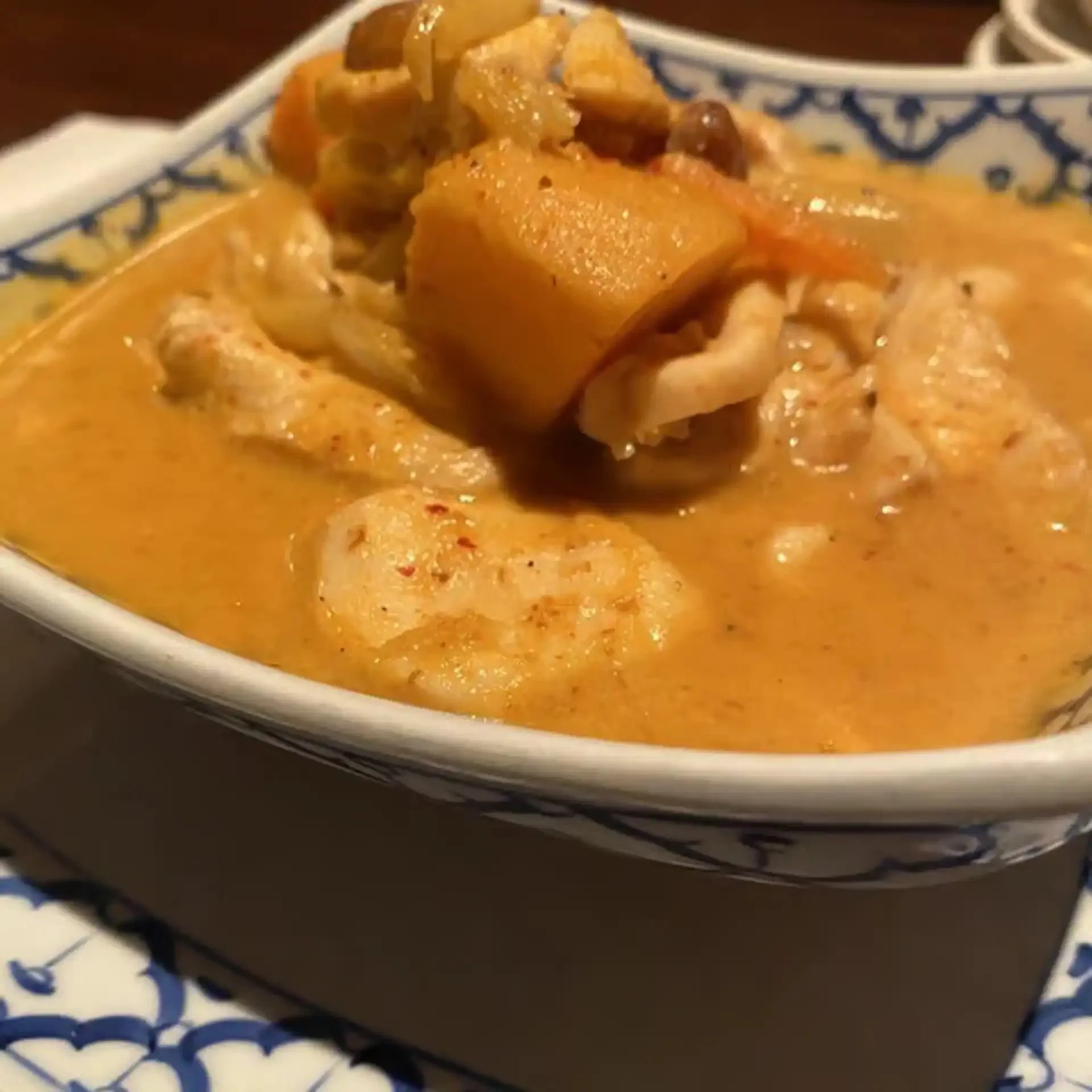 Massaman Curry - A rich, mildly spiced curry with tender meat, potatoes, and roasted peanuts in a velvety coconut milk sauce — a true Thai comfort classic.